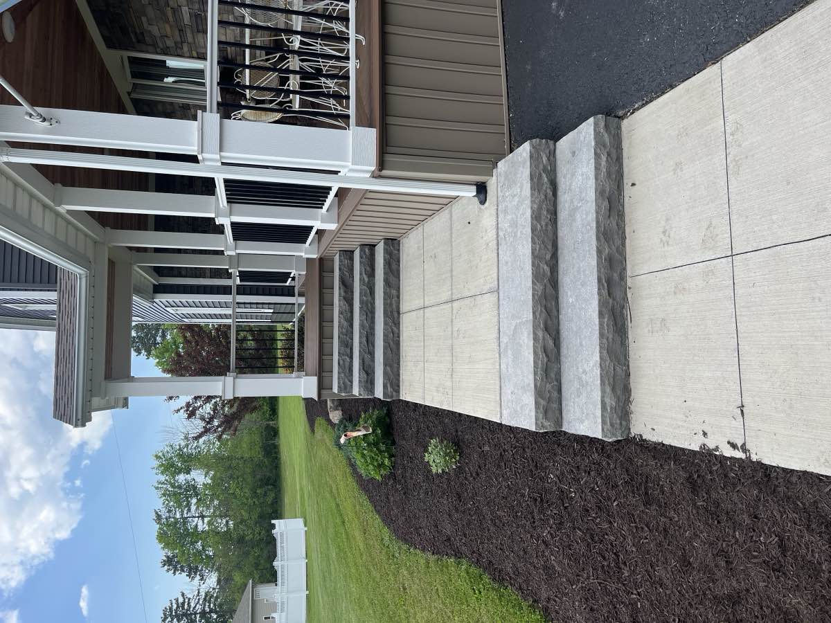 Porch steps with fresh landscaping